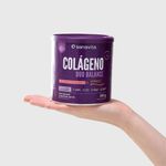 Pote de Colágeno Duo Balance com Verisol, 330g, sendo segurado por uma mão.