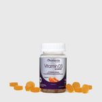 Frasco de Vitamin D3 Gummy Sanavita com 75g e balas de goma ao redor.